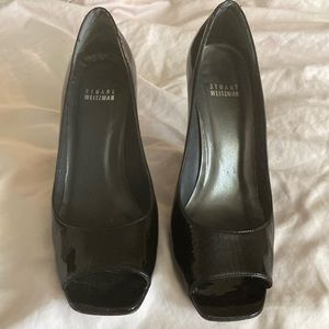 Gorgeous black patent leather peep toe heels by Stuart Weitzman size 8